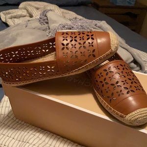 MK brown leather flats